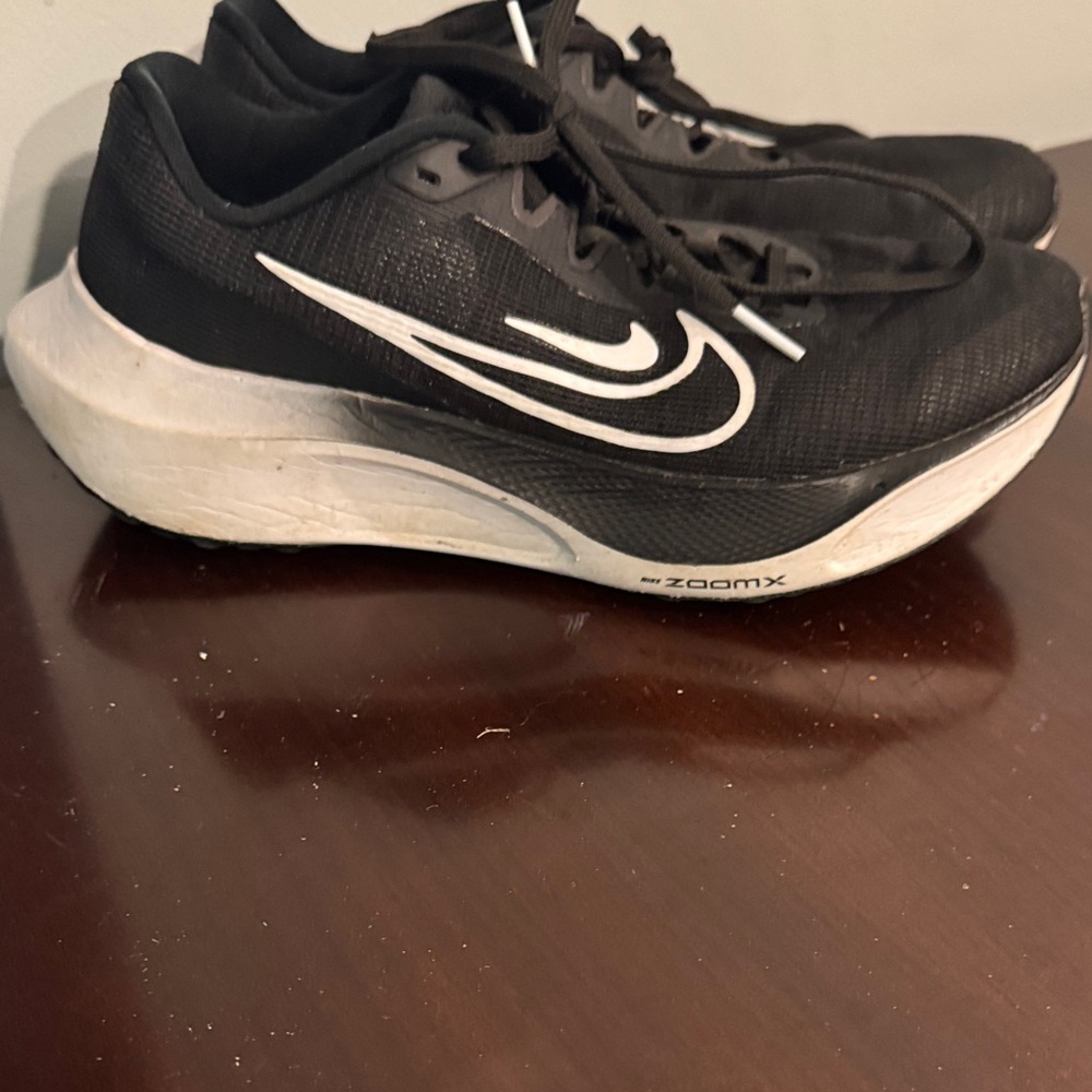 Nike zoom fly 5 size 9.5.  ZoomX Black and White Running Shoes